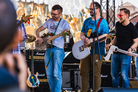 Wroclaw, Poland - May 1 2023: Participants with guitars at open event Guitar Guinness World Record...
