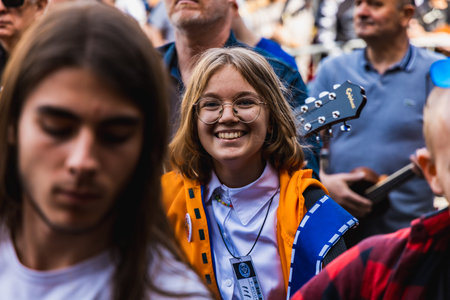 Wroclaw, Poland - May 1 2023: Participants with guitars at open event Guitar Guinness World Record 2023 where record was beaten with 7967 guitars at market squareのeditorial素材