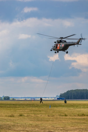 Leszno, Poland - June 16 2023: Antidotum Airshow Leszno 2023 and show of flying helicopter and planes alone and in a groupのeditorial素材