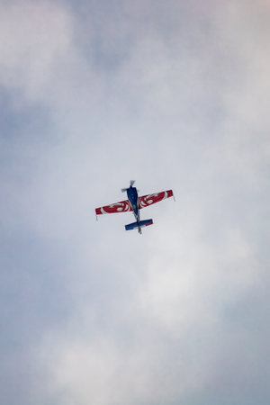 Leszno, Poland - June 16 2023: Antidotum Airshow Leszno 2023 and acrobatic shows full of smoke of Ãquipe de Voltige on blue cloudy skyのeditorial素材
