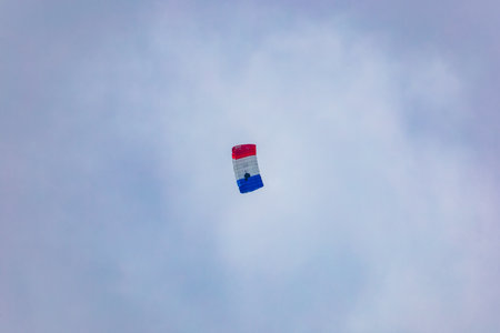 Leszno, Poland - June 16 2023: Antidotum Airshow Leszno 2023 and show of flying helicopter and planes alone and in a group and few flying parachutersのeditorial素材