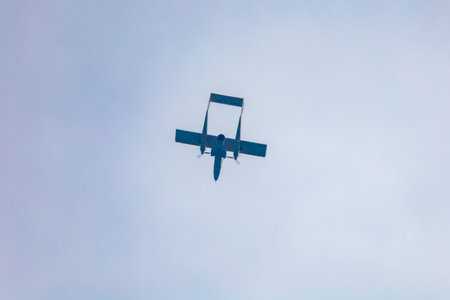 Leszno, Poland - June 16 2023: Antidotum Airshow Leszno 2023 and show of flying helicopter and planes alone and in a group and few flying parachutersのeditorial素材