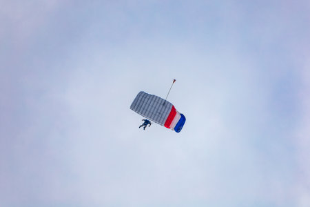 Leszno, Poland - June 16 2023: Antidotum Airshow Leszno 2023 and show of flying helicopter and planes alone and in a group and few flying parachutersのeditorial素材