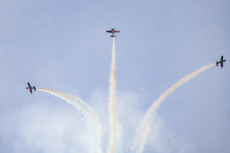 Leszno, Poland - June 16 2023: Antidotum Airshow Leszno 2023 and acrobatic shows full of smoke of The Fyling Bulls Acrobatic Team on a cloudy skyのeditorial素材