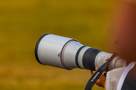 Leszno, Poland - June 17 2023: Canon RF 1200mm lens on modern mirrorless camera at Antidotum Airshow Leszno 2023のeditorial素材