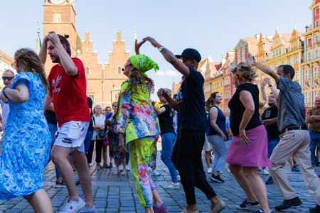 Wroclaw, Poland - July 2 2023: A lot of people dancing Rueda de Casino open event at market squareのeditorial素材