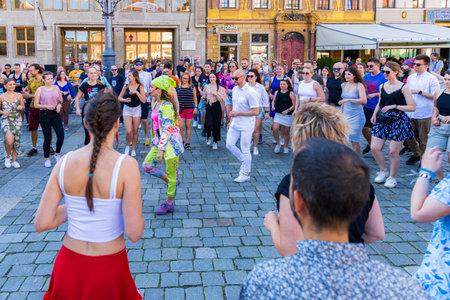 Wroclaw, Poland - July 2 2023: A lot of people dancing Rueda de Casino open event at market squareのeditorial素材