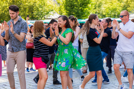 Wroclaw, Poland - July 2023: A lot of people dancing Rueda de Casino open event at market square