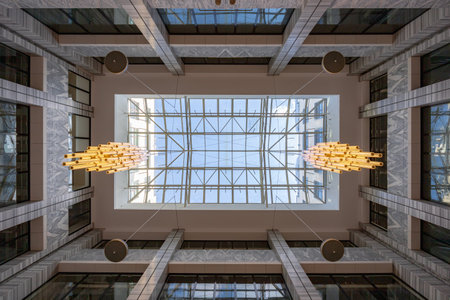 Wroclaw, Poland - July 14 2023: Interiors of beautifully renovated in modern and exclusive style old shopping mall full of marble and lights at city centerのeditorial素材