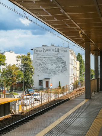 Gdansk, Poland - July 22 2023: Beautiful minimalist mural street art painted on wall of building with plan of Gdansk brewery seen from Wrzeszcz train platformのeditorial素材