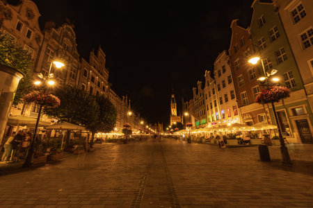 Gdansk, Poland - September 7 2023: Beautiful night cityscapes of streets and buildings of Gdansk...