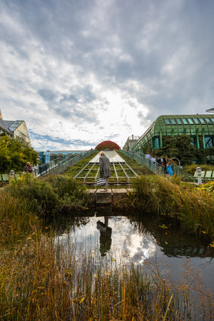 Warsaw, Poland - October 14 2023: Garden of university library with elegant arrangement of flower beds, greenhouses, herb gardens and lawns on the roof of library buildingのeditorial素材