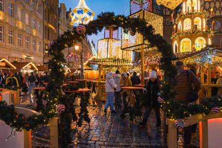 Wroclaw, Poland - January 6 2025: Festive Christmas Market in Wroclaw Poland with Traditional Wooden Stalls and Holiday Lights in the Historic Old Town Squareのeditorial素材
