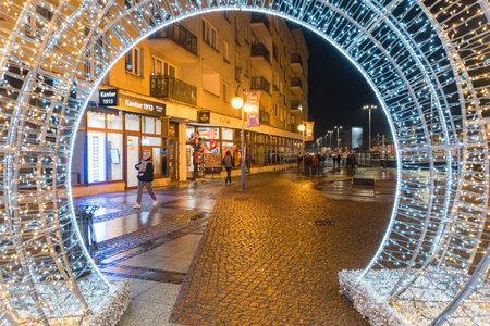 Wroclaw, Poland - January 6 2025: Festive Christmas Market in Wroclaw Poland with Traditional Wooden Stalls and Holiday Lights in the Historic Old Town Squareのeditorial素材