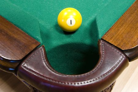 yellow billiard ball with number 
