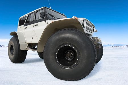 off road vehicle at winter frozen Baikal
