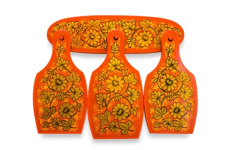 red wooden hardboards in Russian national style with painted flowersの写真素材