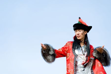 young asian man in fine Mongolian suitの写真素材