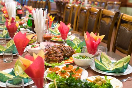 laid table with tableware and dishes, ready for banquet, shallow DOFの写真素材