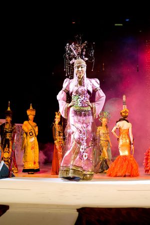 ULAN-UDE, RUSSIA - OCTOBER 29: An asian model demonstrates a dress in ethnic style at the international asian fashion festival on October, 29, 2009 in Ulan-Ude, Buryatia, Russia.のeditorial素材