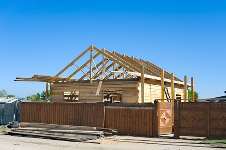 a wooden country house under constructionの写真素材