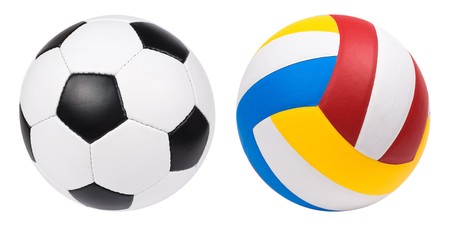a football and a volleyball, isolated on whiteの写真素材