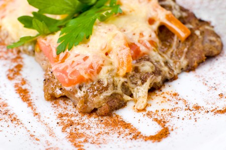 well done beefsteak with tomatoes and cheese, macroの写真素材