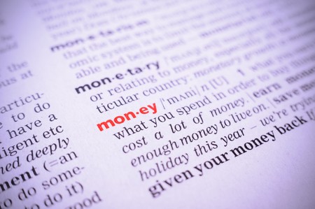 the word money in a glossary, macro, violet toningの写真素材