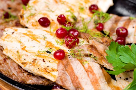 grilled chicken, beef and pork chops with cranberries, macroの写真素材