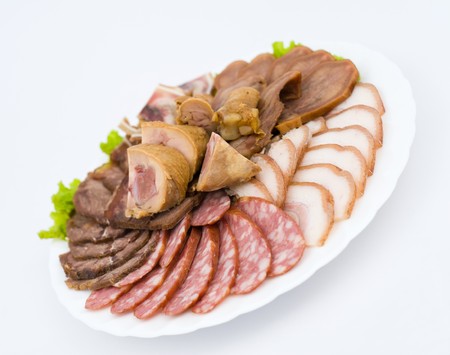 slices of smoked pork and smoked sausage