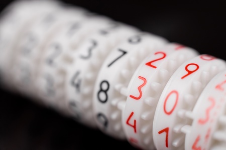 a roller with figures pulled out of a water meter, macroの写真素材