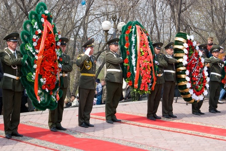 ULAN-UDE, RUSSIA - MAY 9: Guard of honour lay wreaths to the fallen during WWII memorial on annual...