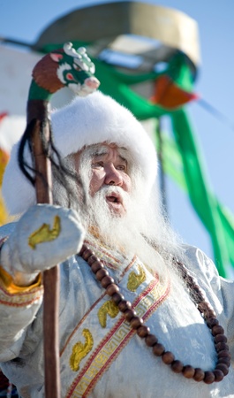 ULAN-UDE, RUSSIA - FEBRUARY 14: An actor depicts White Old Man (buryat Santa) on the oriental New Year's day which coincided with the Pancake festival, February, 14, 2010, Ulan-Ude, Russia.のeditorial素材