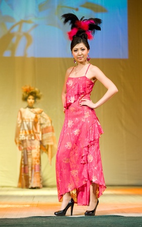 ULAN-UDE, RUSSIA - APRIL 16: A model demonstrates a hairdo by Radzhana Baldayeva, a known hair stylist, at her fashion show, April, 16, 2010 in Ulan-Ude, Buryatia, Russia.のeditorial素材