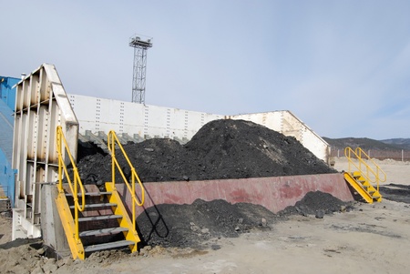 TUGNUI, RUSSIA - APRIL 2: The opening of Tugnuiskaya coal-preparation plant. A place where haulers unload coal, April, 2, 2008 in Tugnui, Buryatia, Russia.のeditorial素材