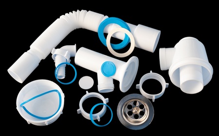 details of a disassembled PVC kitchen sink trapの写真素材