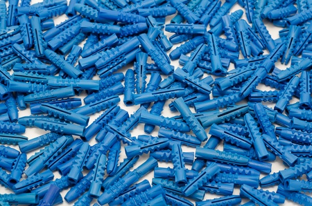 a lot of new blue plastic dowels