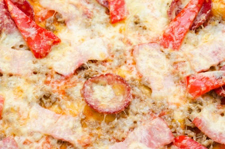 a pepperoni pizza with bell pepper, a closeup shotの写真素材