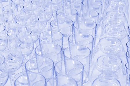 a lot of empty glasses on buffet table, catering
