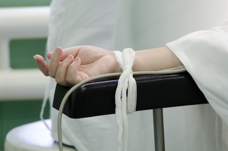 a hand of a patient during a surgical operation - closeup