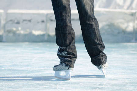 legs in skates of an amateur skater