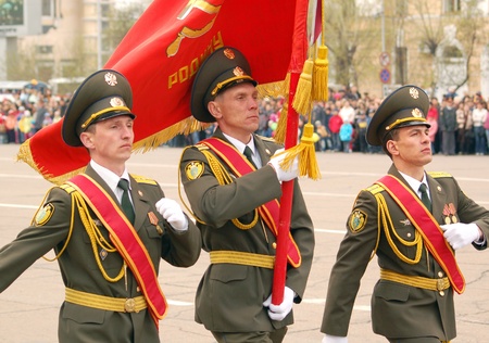 ULAN-UDE, RUSSIA - MAY 9  Unidentified Russian officers with a red banner march at the parade on annual Victory Day, May, 9, 2007 in Ulan-Ude, Buryatia, Russia のeditorial素材