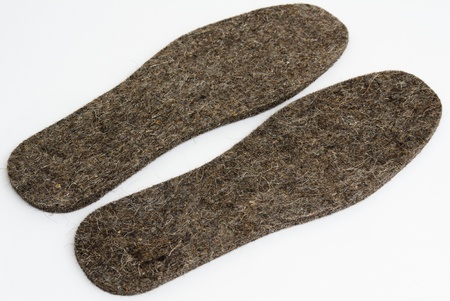 a pair of big woolen new insoles