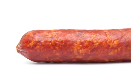 a cervelat, a smoked spicy sausage, over whiteの写真素材