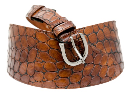 a ladies brown leather belt, isolated over white