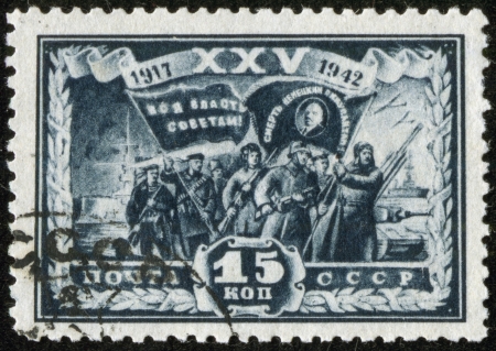 SOVIET UNION - CIRCA 1942  A stamp printed by the Soviet Union Post is entitled  All power to soviets  Death to german invaders   It shows Russian soldiers with banners, circa 1942のeditorial素材