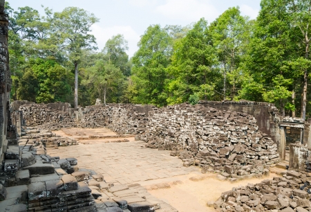 piles of stones in yard of Bayon, temple complex in Angkor Thom  の写真素材