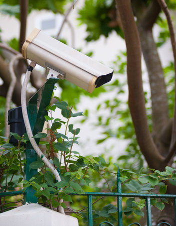 outer video surveillance camera set on fence