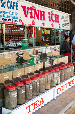 DALAT, VIETNAM - AUGUST 2, 2014: An unidentified woman sells tea and coffee at the city central market (Cho Da Lat), one of major tourist attractions in the city.のeditorial素材