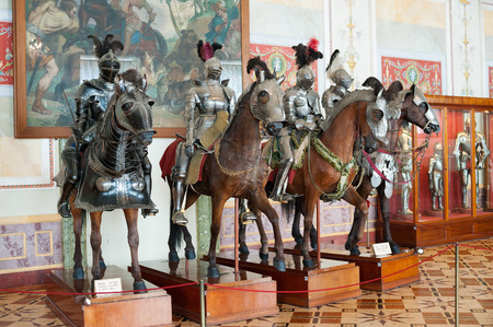 ST. PETERSBURG - JUNE 30, 2011: Knights mannequins on horses at Knights Hall of the Hermitage. It hosts a part of the Hermitage Arsenal collection.のeditorial素材